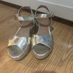 Aerosoles worn twice so stylish and comfortable. The only heels I can wear.